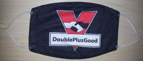 a face mask saying “DoublePlusGood” with IngSoc’s emblem from the Nineteen Eighty-four film